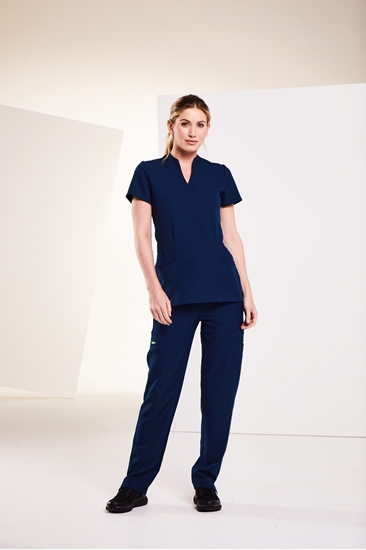 Female posing in eclipse colour scrub top and trousers